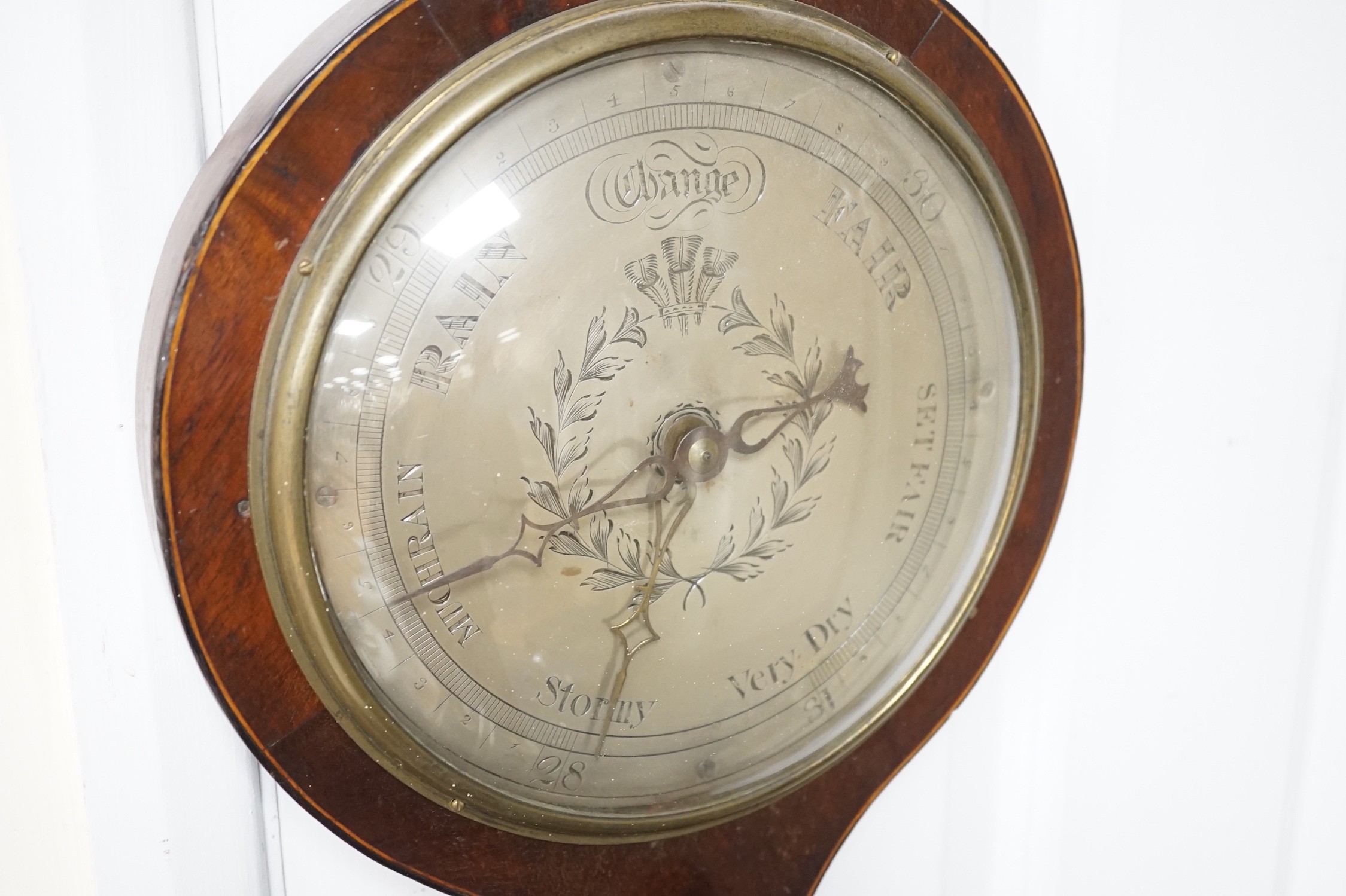 A 19th century mahogany banjo barometer, 95cms high